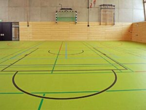 empty gymnasium with lines on the floor