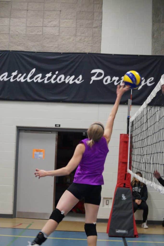setter tipping the ball over the net