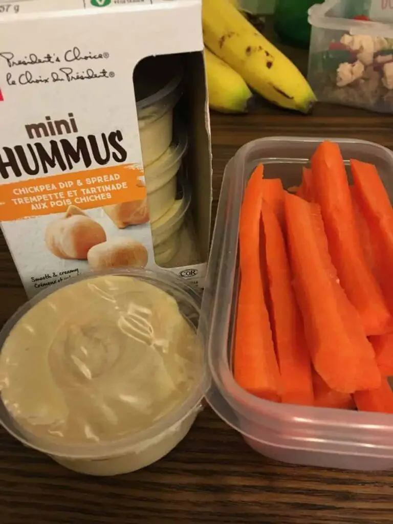 carrot sticks and mini hummus dip