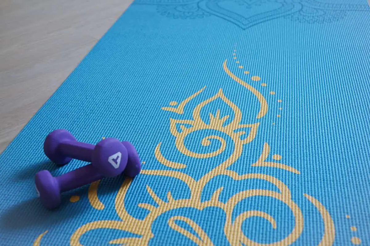 Yoga matt with dumbbells