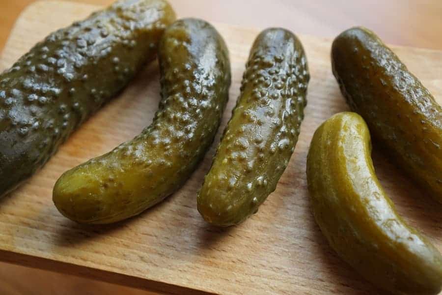 pickles on a wooden cutting board