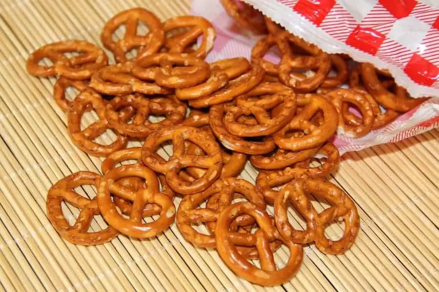 bag of small preztels spilling onto a table