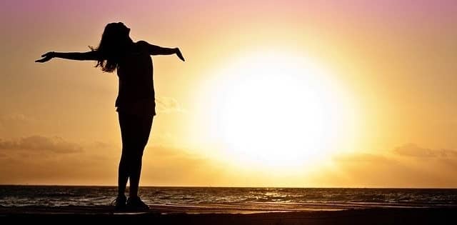 Woman standing on a beach