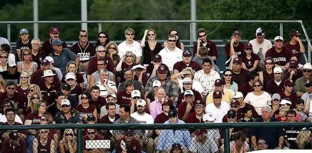 People sitting watching a sports event