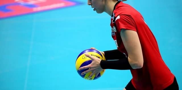 Volleyball Player Holding a Volleyball