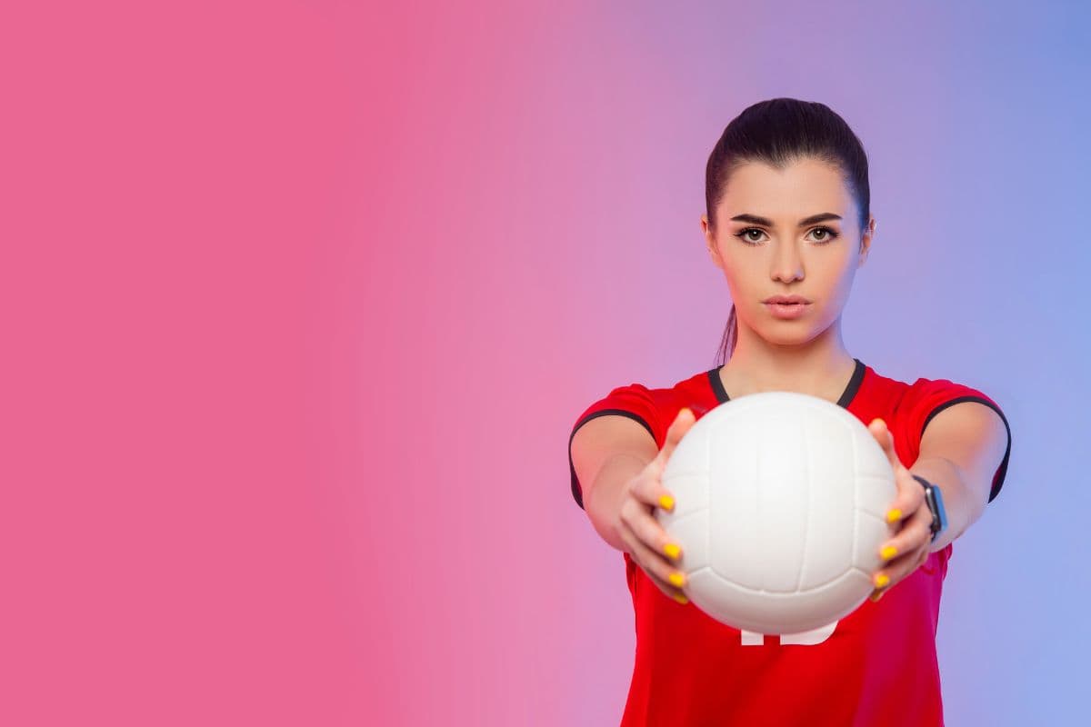 Woman holding a volleyball