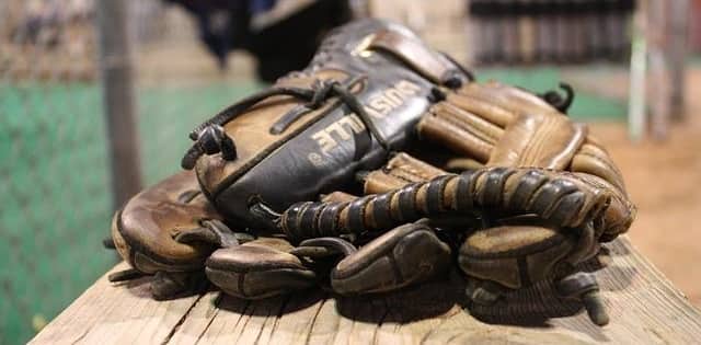 Baseball glove on a bench