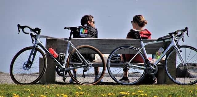 Two people resting on a bench