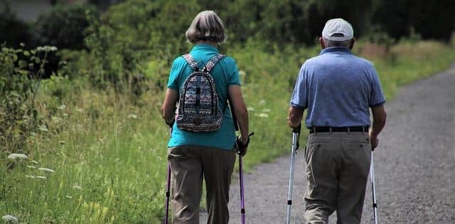 Two older people hiking