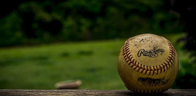 A hard ball on a picnic table