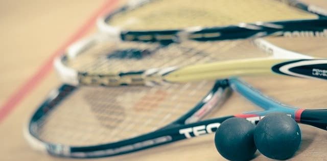 Squash racket with balls 