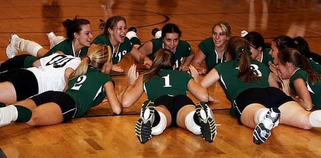 Volleyball team on gym floor